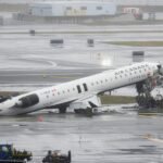 Jet collides with fire truck at New York’s LaGuardia Airport. 2 pilots killed