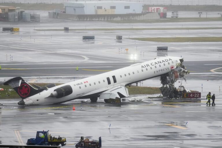 Jet collides with fire truck at New York’s LaGuardia Airport. 2 pilots killed