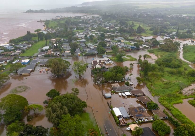 Over 5,500 told to evacuate flooding in Hawaii as officials warn 120-year-old dam could fail