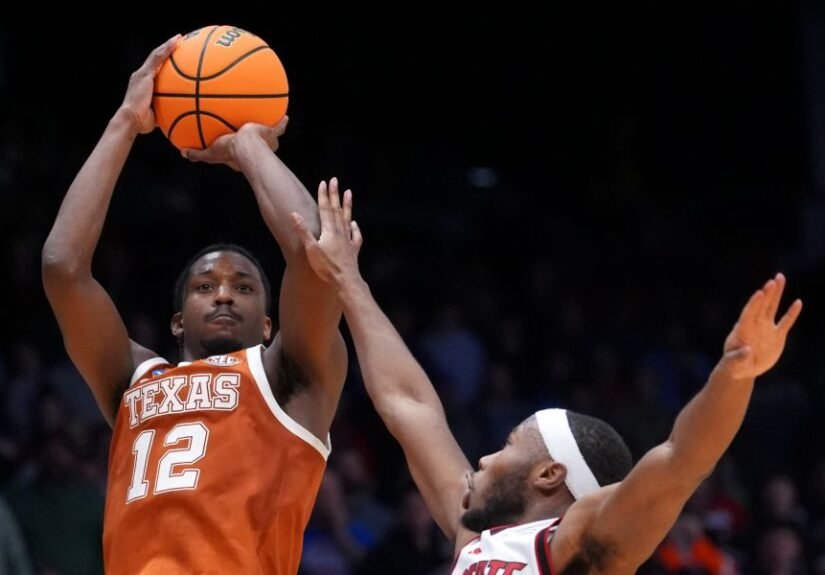 Tramon Mark’s late jumper gives Texas a 68-66 win over NC State in the First Four